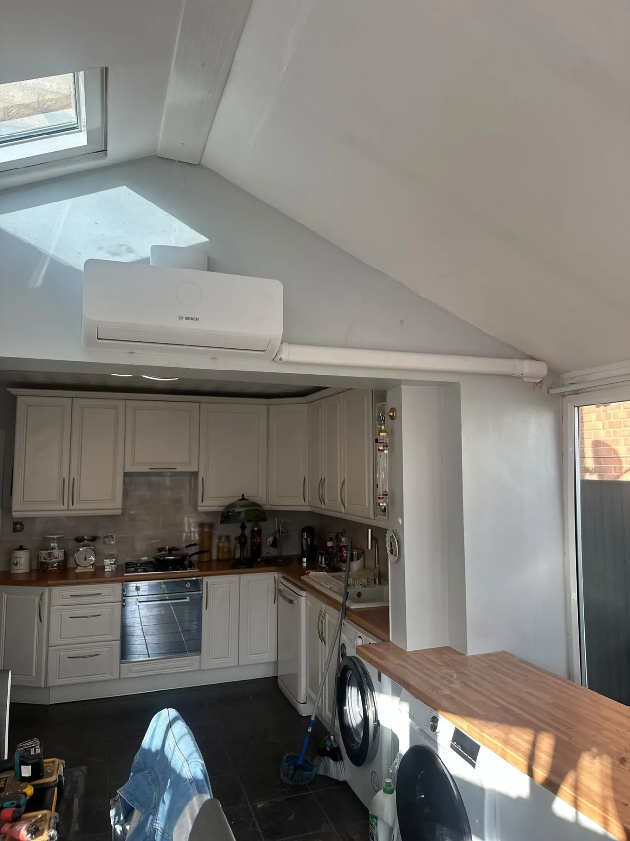 Bosch wall-mounted air conditioning in a loft-style kitchen