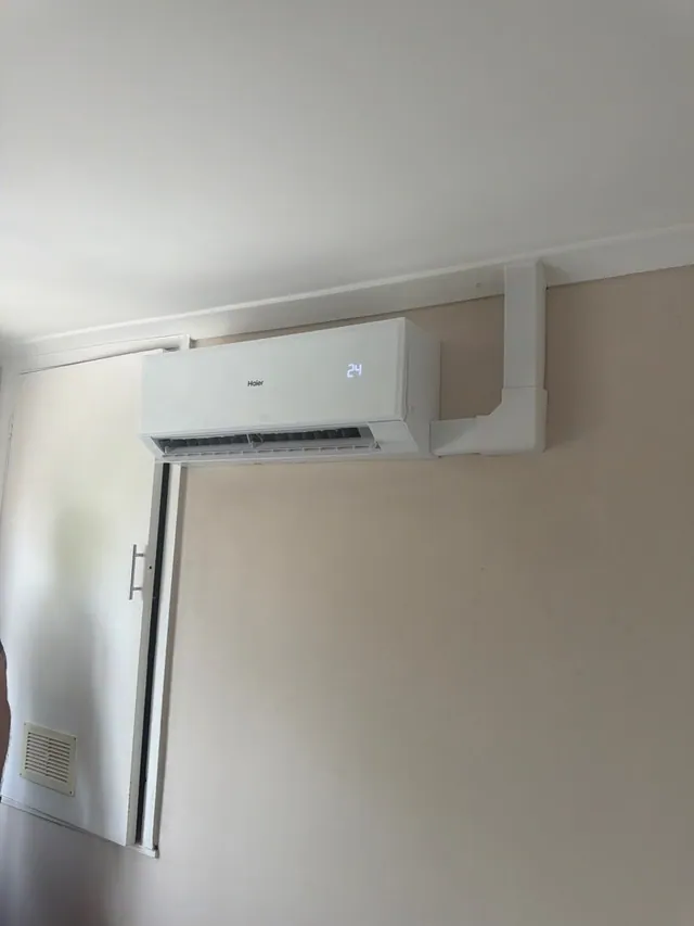 Haier wall-mounted air conditioning unit with surface trunking