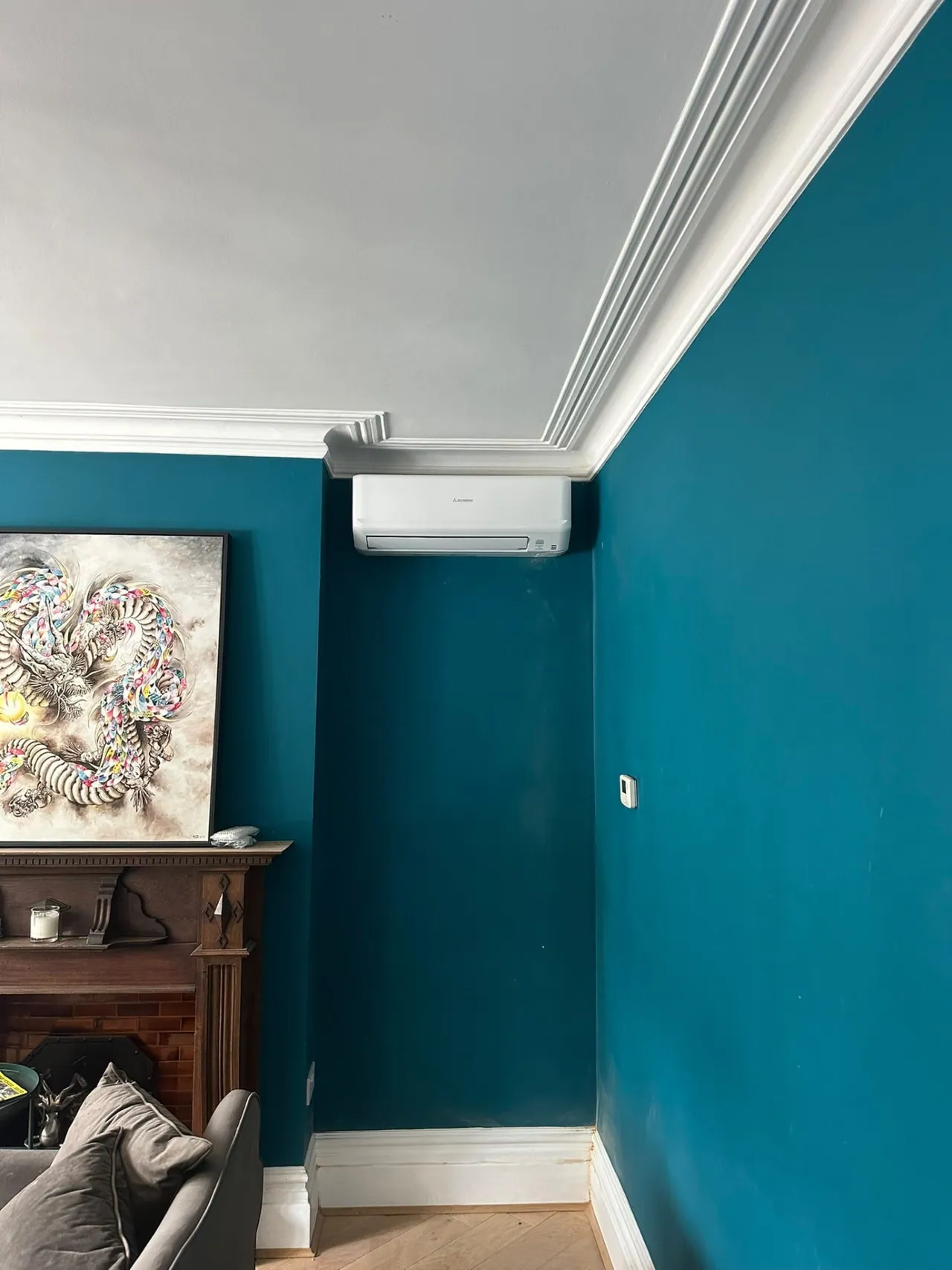 Wall-mounted air conditioning unit installed by Greenwich Heating Solutions in a South East London living room