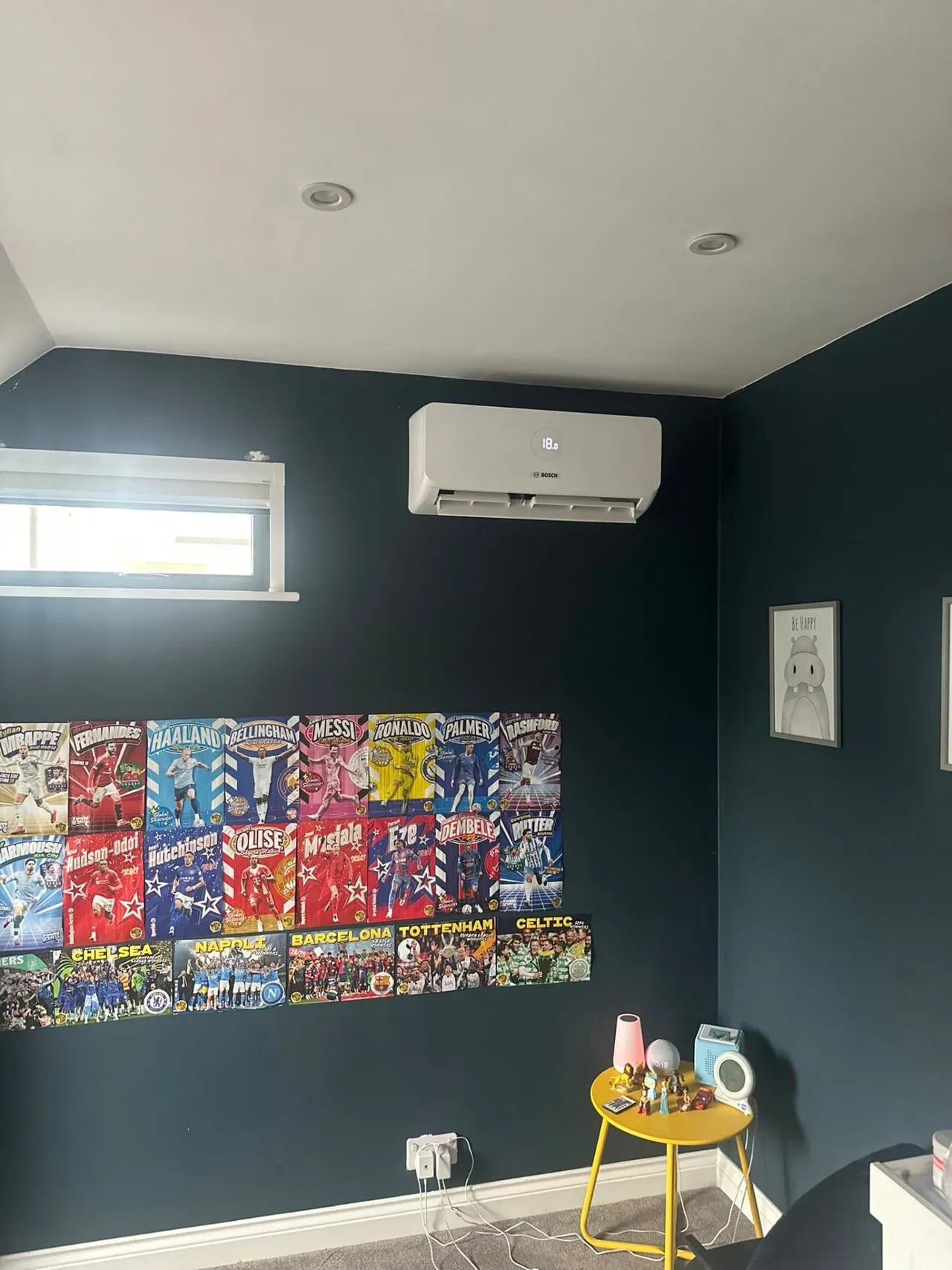 Bosch wall-mounted air conditioning on a bedroom feature wall